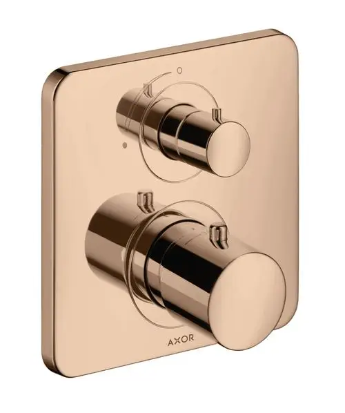 Thermostat-Wandbedienelement von AXOR in poliertem rotem Gold mit zwei Drehknöpfen zur Temperatur- und Wasserflussregelung, montiert auf einer quadratischen Platte.